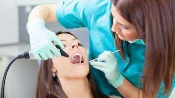 woman sitting in a dental chair