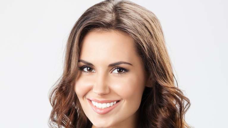 woman with dental implants in tazewell va